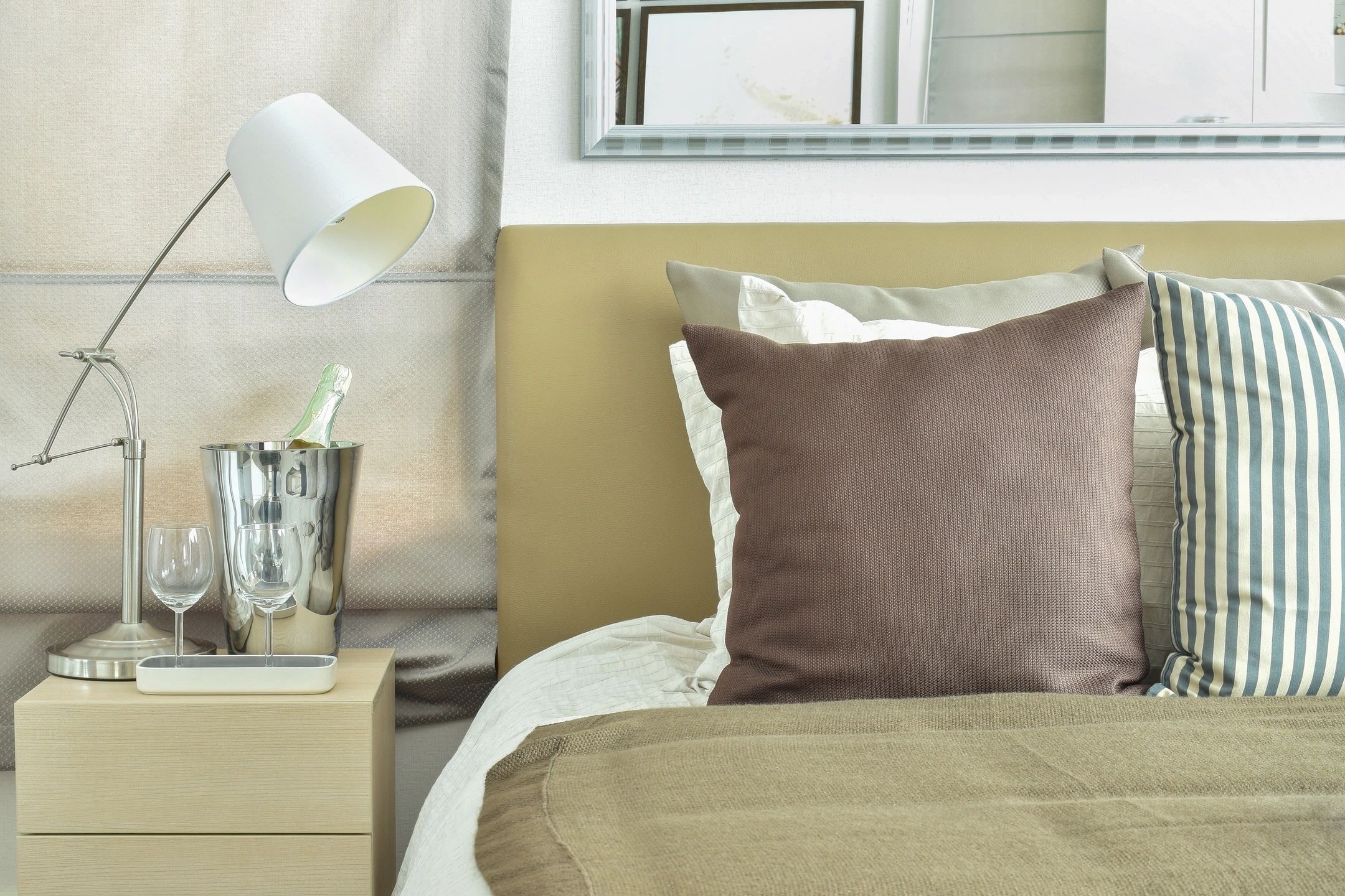 Hotel bedroom with yellow-green headboard